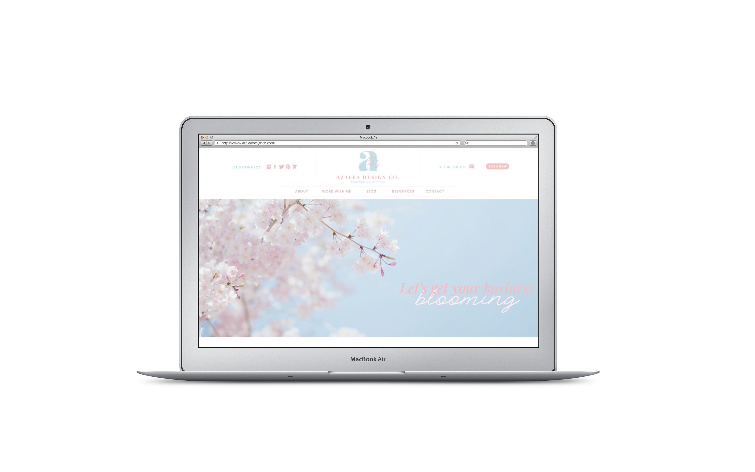 MacBook screen with Azalea Design Co.'s home page
